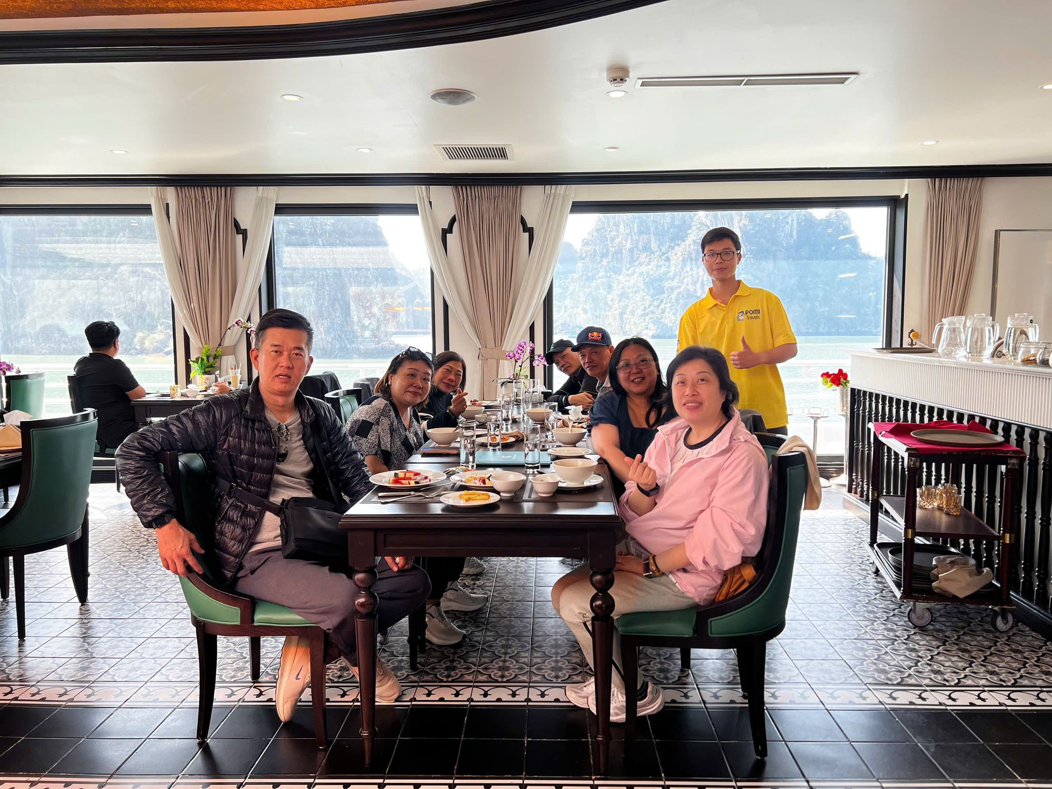 Group dining on Ha Long Bay cruise