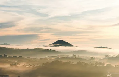 Sea of clouds over the highlands at sunrise near Lang Biang Mountain, Da Lat