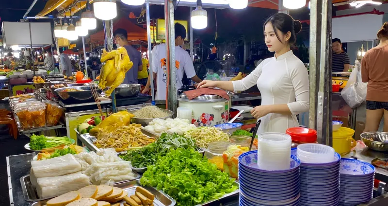 Vietnamese street food spread with banh mi and noodles