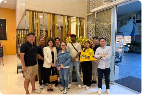 The whole family group together in the hotel lobby