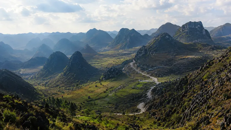 Winding road through the Dong Van Karst Plateau UNESCO Geopark