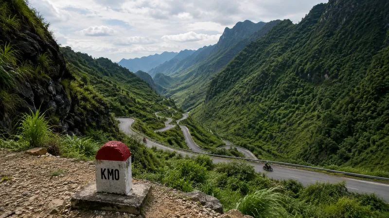 KM0 milestone marker in Ha Giang town at the start of the loop
