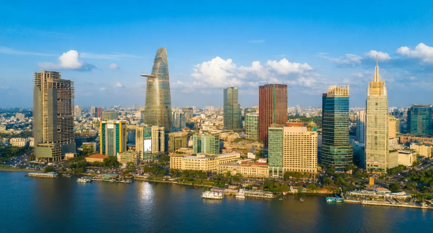 Ho Chi Minh City skyline with Bitexco Financial Tower along the Saigon River in daylight
