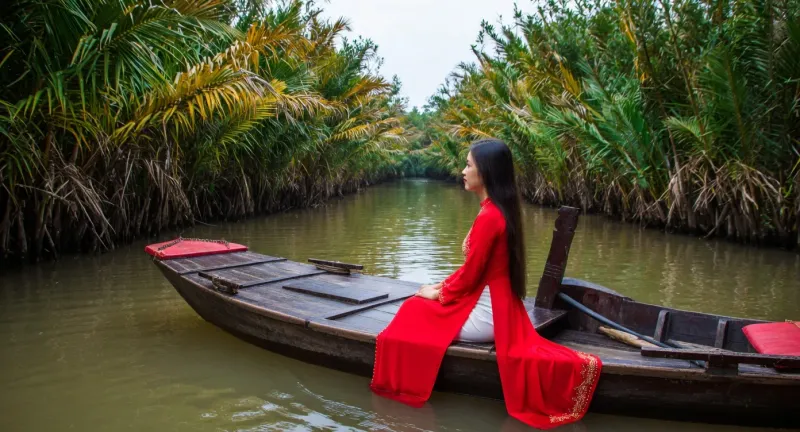 Mekong Delta wooden sampan boat on the river near Ho Chi Minh City